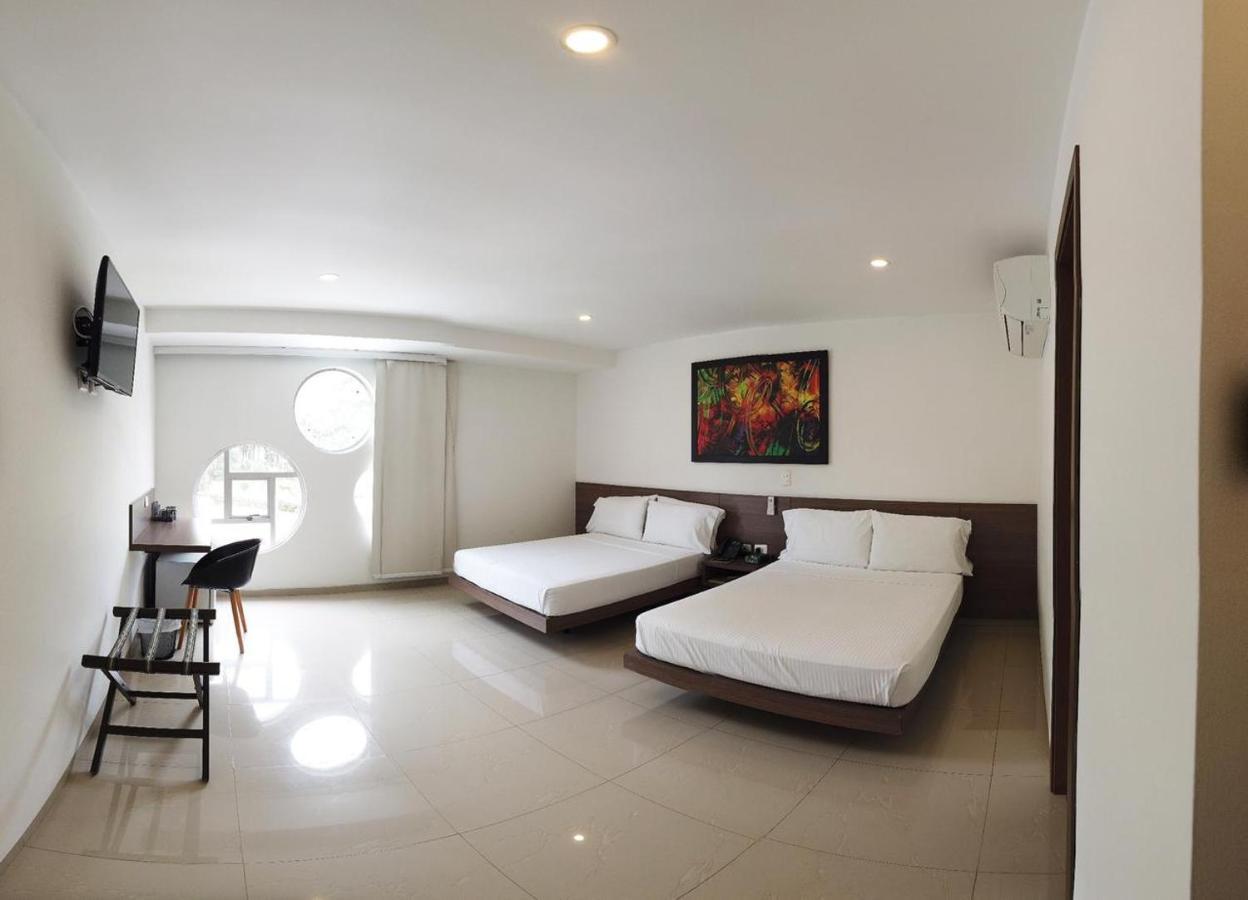 Hotel Mio Boutique Кукута Экстерьер фото